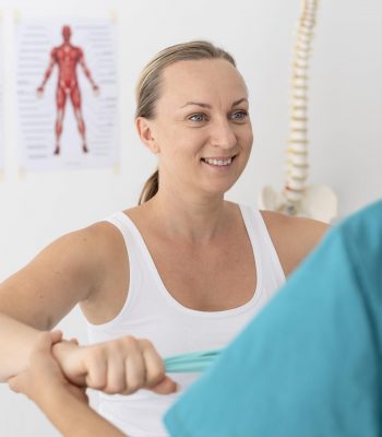 woman having physiotherapy session scaled